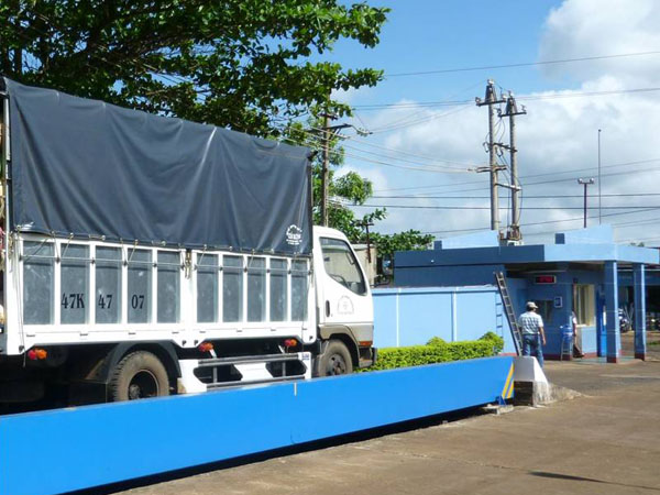 Truck at a weighing station Truck at a weighing station